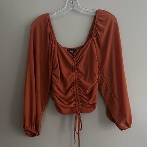 Rust-orange, ruched, long sleeve crop top
